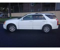 SELLING 2008 CADILLAC SRX AWD V6 4D SUV 70.000 miles only - $9800 (Queens, NYC)