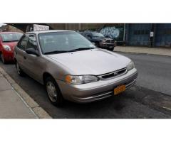 2000 toyota corolla law miles need to be gone - $1900 (Astoria, NYC)